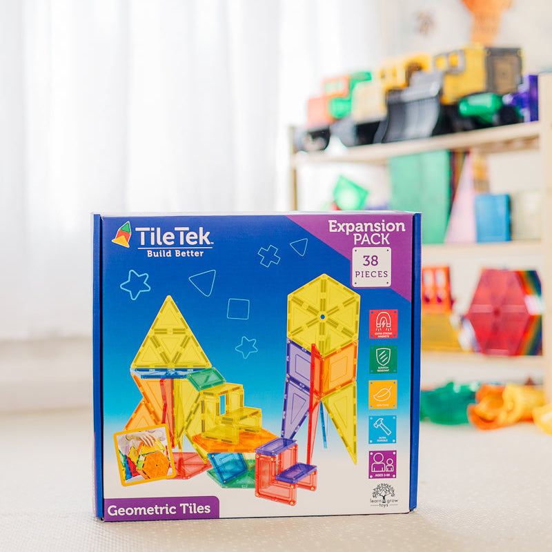 TileTek geometric tiles expansion pack on a shelf with colourful toys in the background