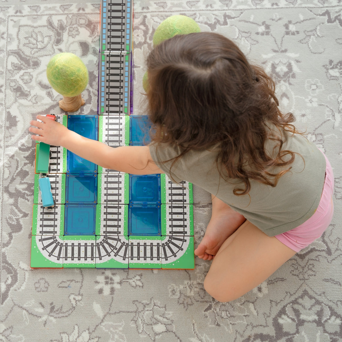36 Pieces Tile Toppers Train Pack - Child Building a Train Track