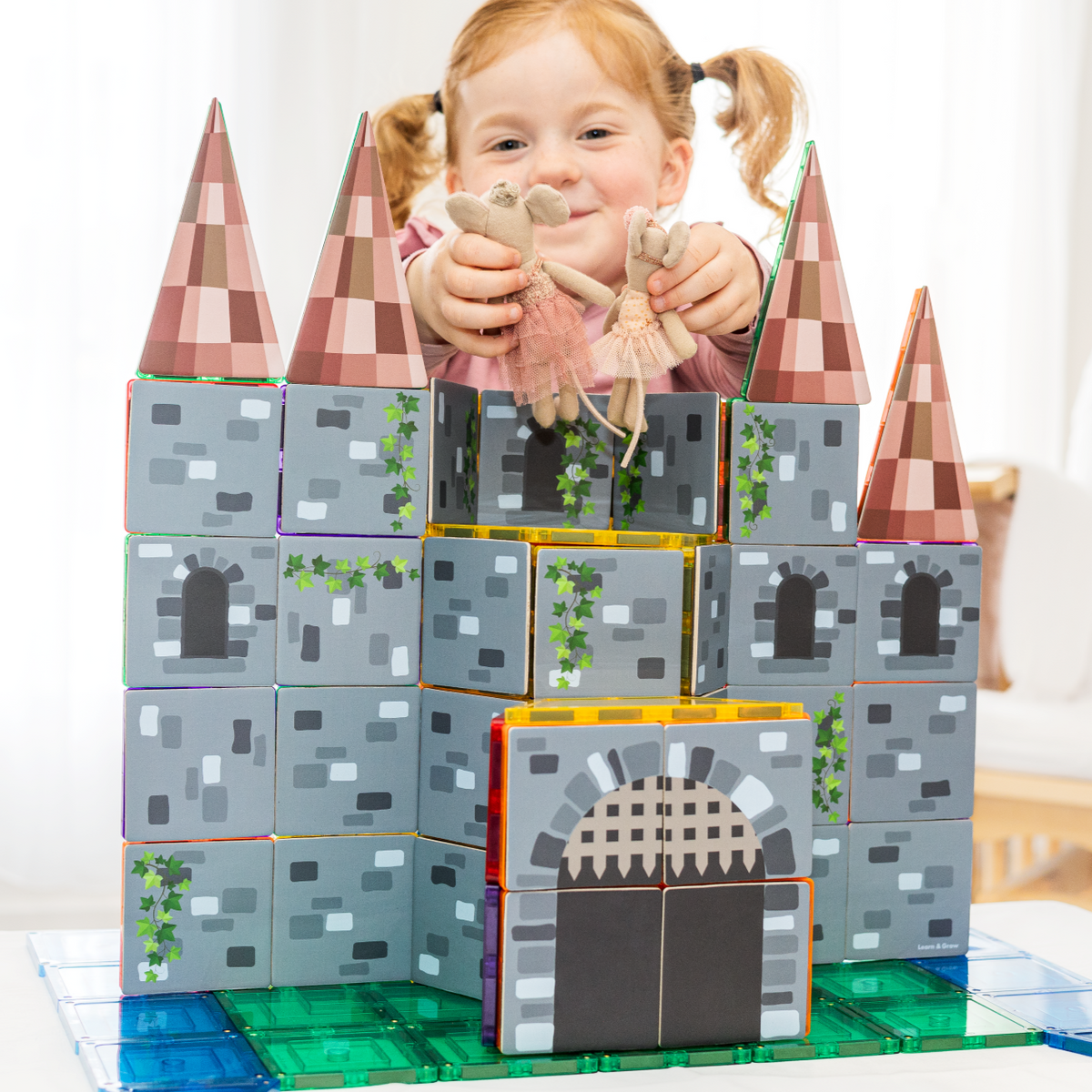 40 Pieces Tile Toppers Castle Pack - Child Playing with Castle Construction