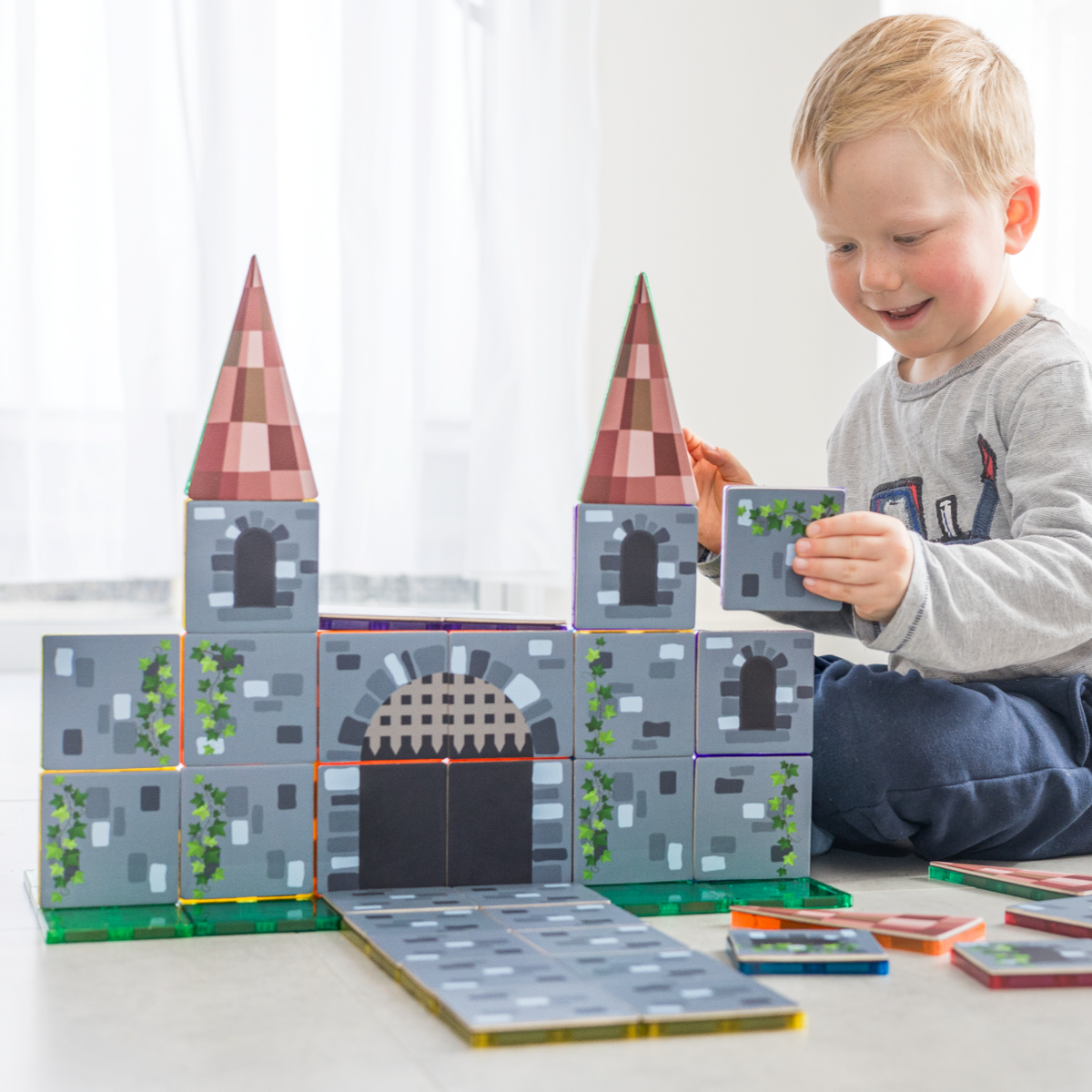40 Pieces Tile Toppers Castle Pack - Child Playing with Castle Scene