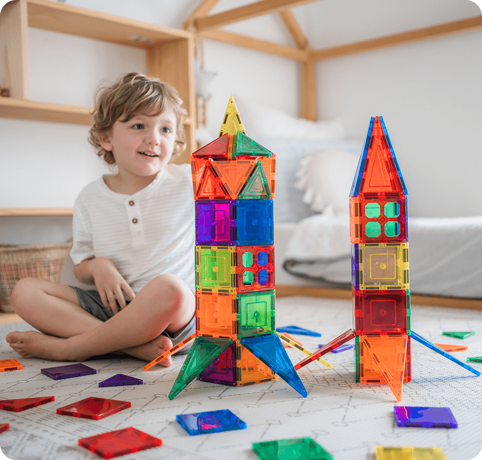 Child playing with TileTek magnetic tiles