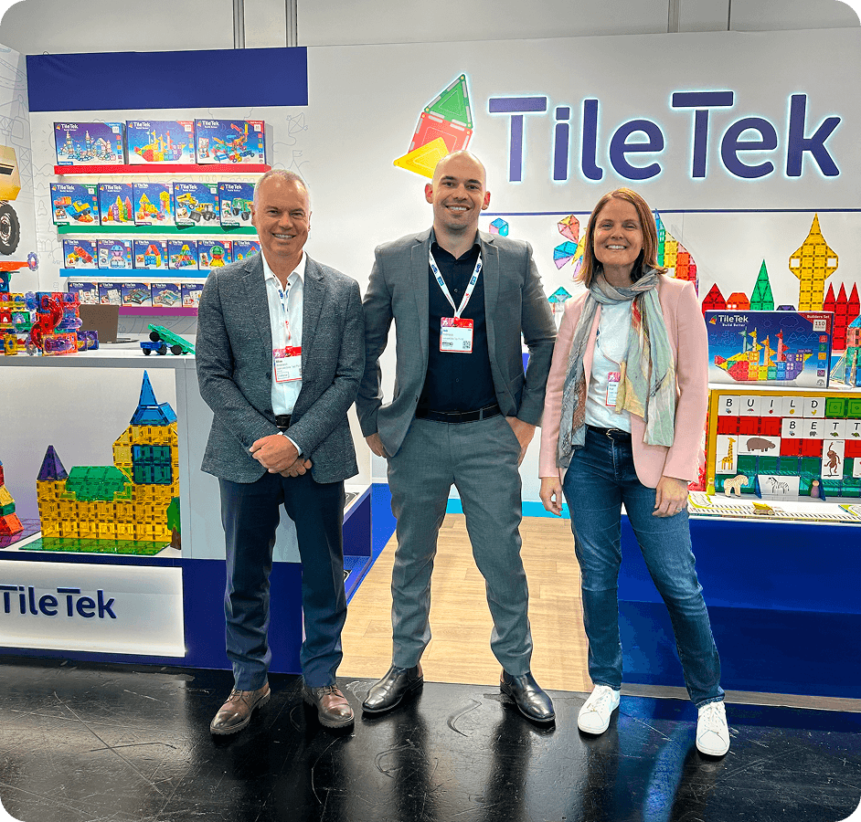 The TileTek family team at a toy fair booth